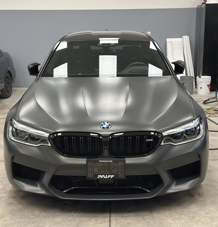 BMW M5 sports sedan after premium paint correction and protection treatment