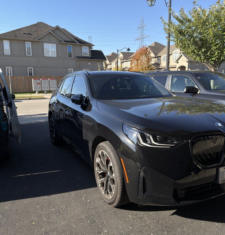 BMW X3 SUV undergoing comprehensive exterior and interior detailing package