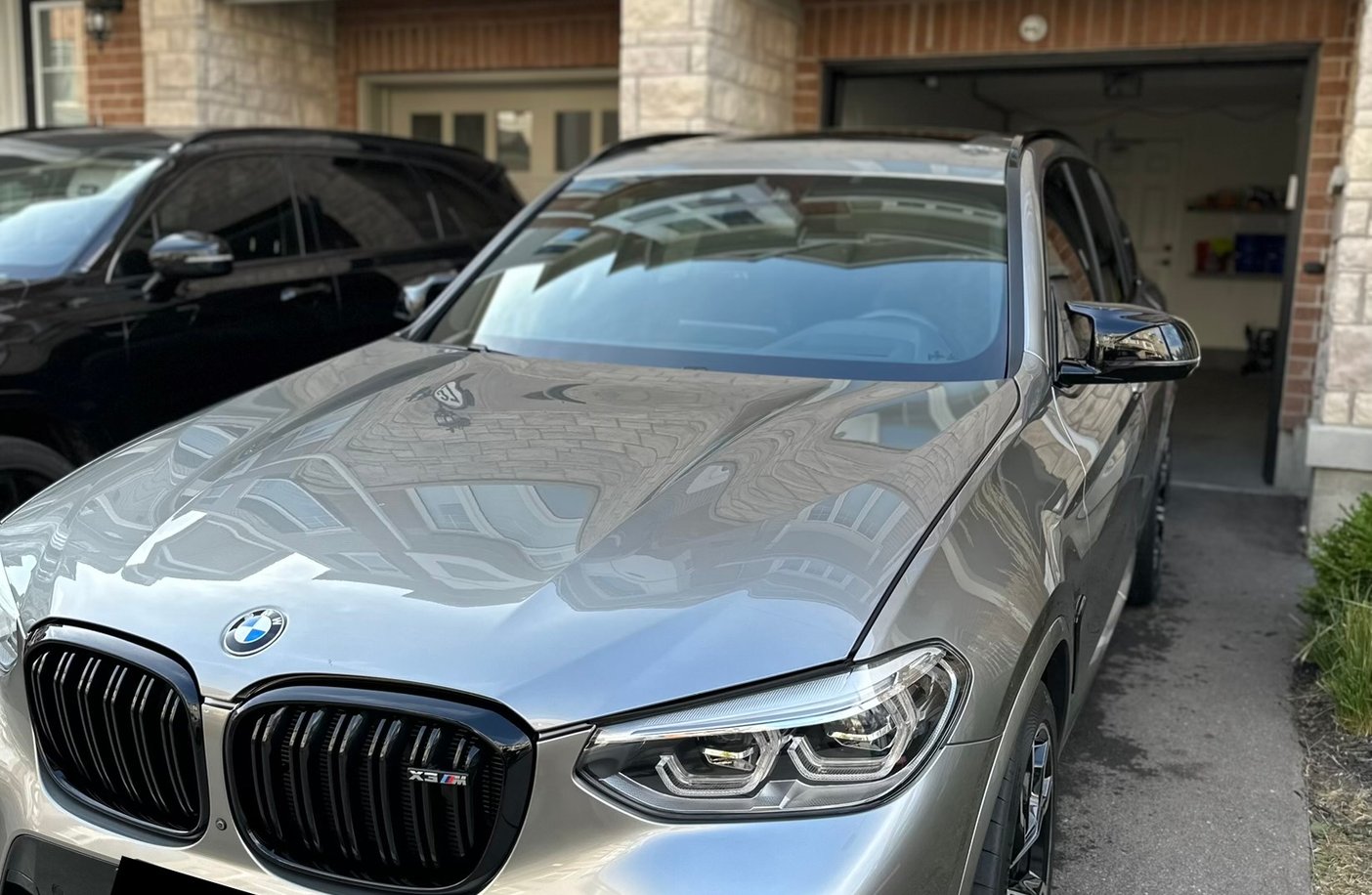 Professional ceramic coating application on car paint