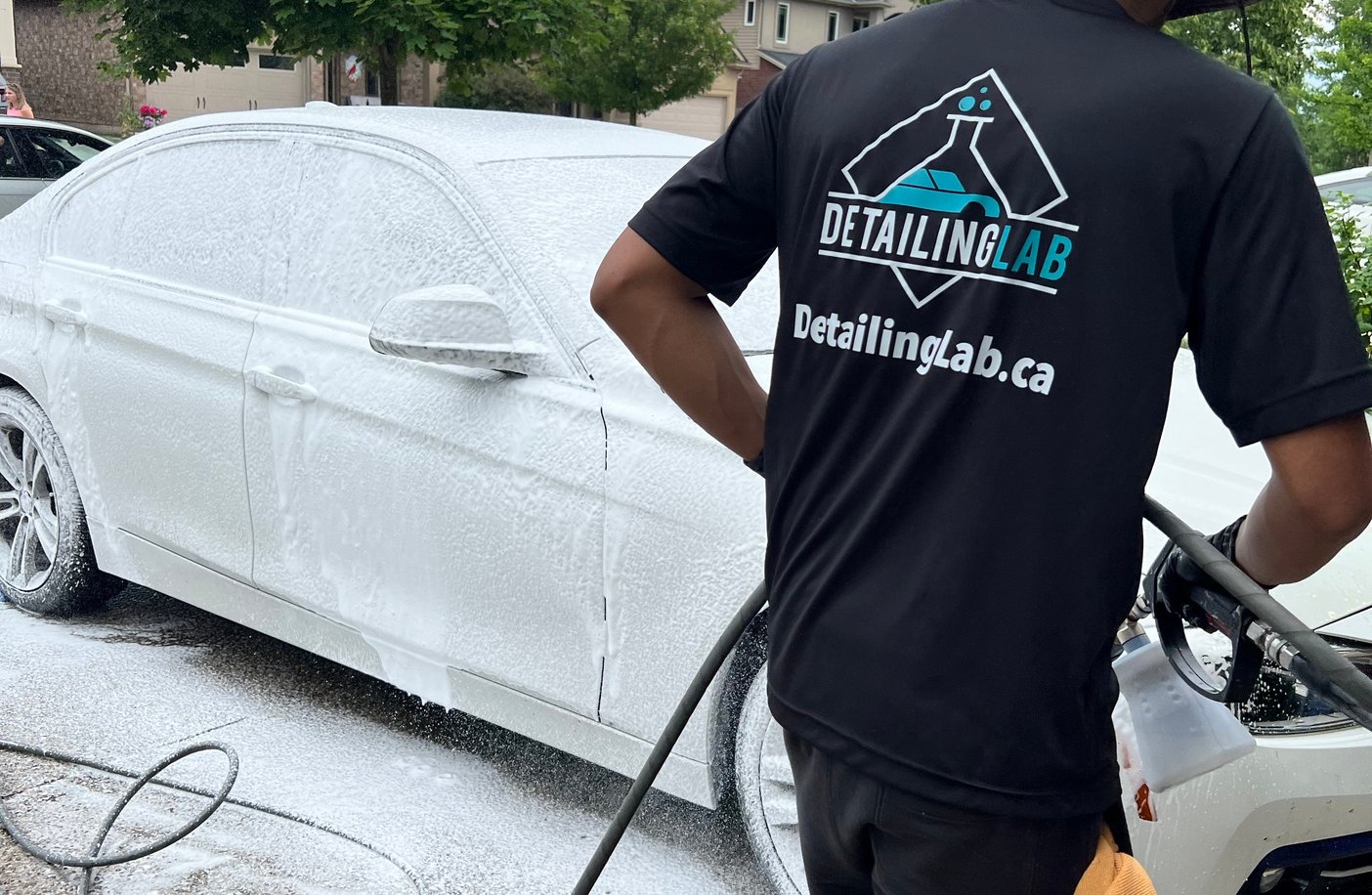 Professional car exterior detailing in progress