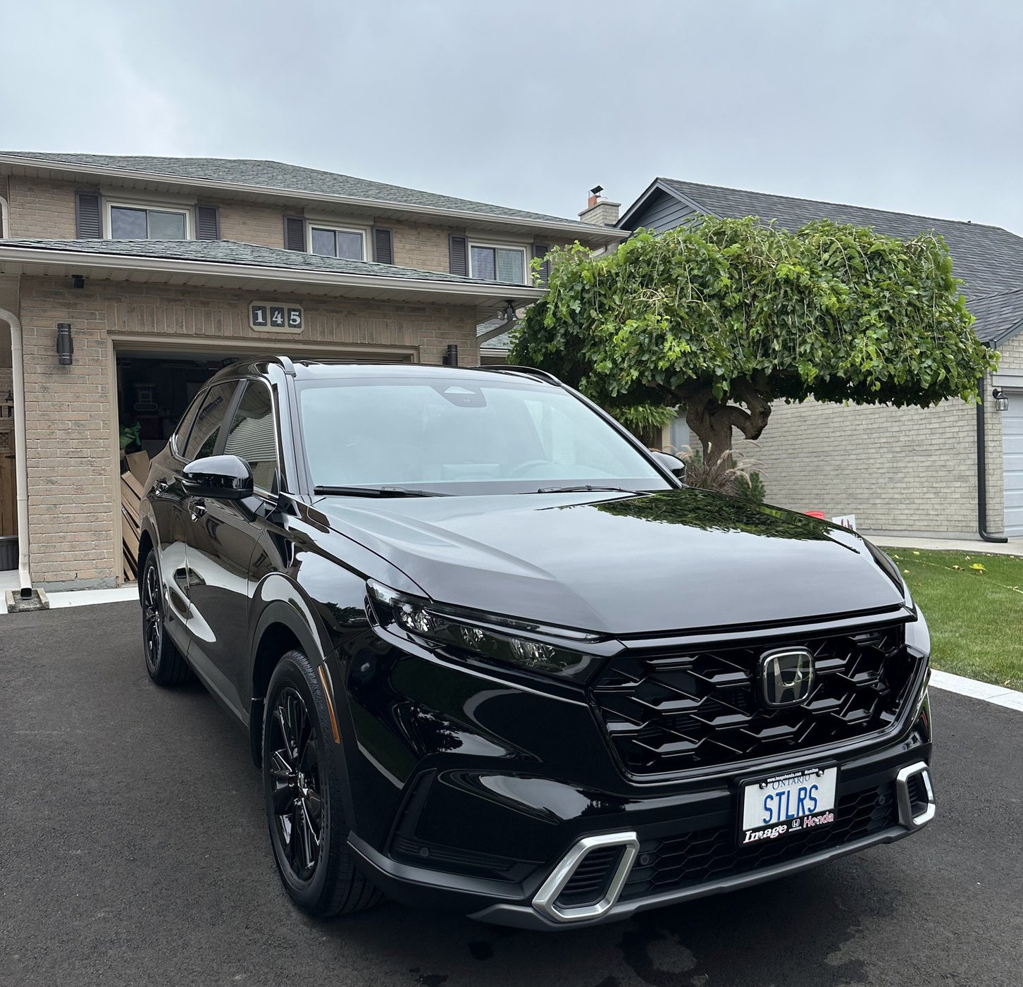 Exterior car wash at Ancaster Ontario driveway