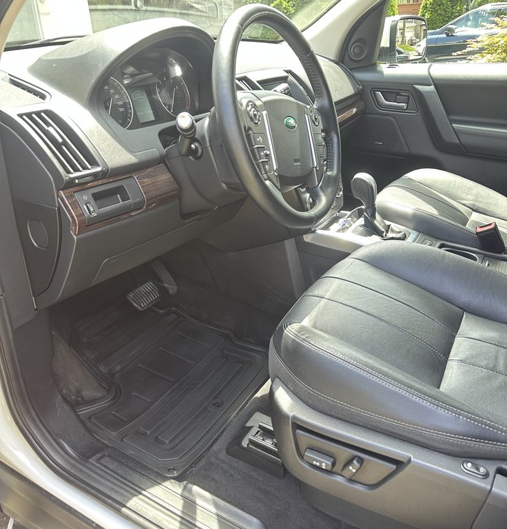 Land Rover SUV after premium detailing service showing enhanced gloss and protection