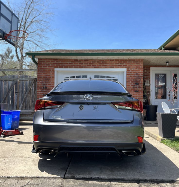 Lexus IS250 sedan after clay bar treatment and wax application