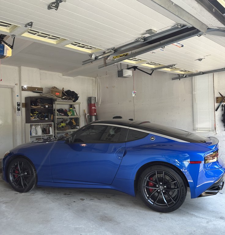 Nissan Z sports car with glossy finish after paint correction and polishing